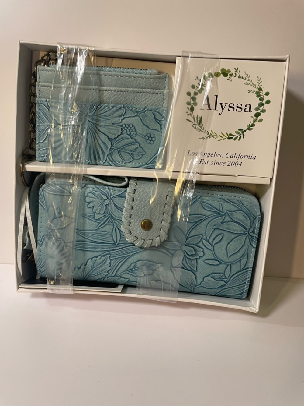Alyssa Embossed Floral Zip Wallet & Card Case Set in Light Blue. vegan leather.